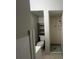Small bathroom with shower, toilet, and vanity at 127 W Palmetto Ave, Deland, FL 32720
