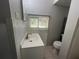 Small bathroom with toilet and vanity at 127 W Palmetto Ave, Deland, FL 32720