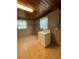 Laundry room with tile floors and wood ceiling at 127 W Palmetto Ave, Deland, FL 32720