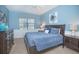 Spacious bedroom with a king-size bed and ample closet space at 1427 Wexford Way, Davenport, FL 33896