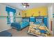 bedroom with two twin beds and Minions decor at 1427 Wexford Way, Davenport, FL 33896