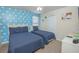 ' bedroom with twin beds and a Toy Story theme at 1427 Wexford Way, Davenport, FL 33896