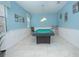 Fun game room with a pool table, providing entertainment for all ages at 1427 Wexford Way, Davenport, FL 33896