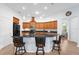 Spacious kitchen with granite countertops, stainless steel appliances, and a breakfast bar at 164 Pergola Pl, Ormond Beach, FL 32174