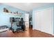 Bright office with a sliding closet, wood floors, and a modern desk setup at 164 Pergola Pl, Ormond Beach, FL 32174