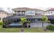 Backyard with hot tub, patio, and covered lanai at 16767 Rusty Anchor Rd, Winter Garden, FL 34787