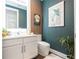 Stylish bathroom with modern vanity and dark green walls at 16767 Rusty Anchor Rd, Winter Garden, FL 34787