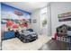 bedroom with race car bed and Cars mural at 16767 Rusty Anchor Rd, Winter Garden, FL 34787