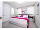 Bright bedroom with king-size bed and en-suite bathroom at 16767 Rusty Anchor Rd, Winter Garden, FL 34787