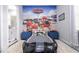 bedroom with race car bed and Cars mural at 16767 Rusty Anchor Rd, Winter Garden, FL 34787