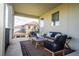 Covered patio with comfortable seating and views of the community at 16767 Rusty Anchor Rd, Winter Garden, FL 34787