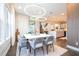 Bright dining room with a white table and gray chairs at 16767 Rusty Anchor Rd, Winter Garden, FL 34787