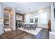 Bright dining room with hardwood floors and modern chandelier at 16767 Rusty Anchor Rd, Winter Garden, FL 34787