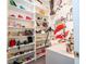 Large walk-in closet with shelving and stylish wall art at 16767 Rusty Anchor Rd, Winter Garden, FL 34787
