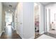 Bright hallway with access to linen closet and bedrooms at 16767 Rusty Anchor Rd, Winter Garden, FL 34787