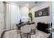 Spacious home office with two chairs and a large desk at 16767 Rusty Anchor Rd, Winter Garden, FL 34787