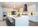 Gourmet kitchen boasts modern appliances and expansive island at 16767 Rusty Anchor Rd, Winter Garden, FL 34787
