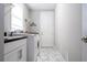 Bright laundry room with washer, dryer, and ample counter space at 16767 Rusty Anchor Rd, Winter Garden, FL 34787