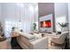 Living room features a marble fireplace and large TV at 16767 Rusty Anchor Rd, Winter Garden, FL 34787