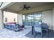Covered patio with sectional sofa and dining set at 16767 Rusty Anchor Rd, Winter Garden, FL 34787