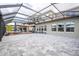 Spacious covered patio with hot tub and seating at 16767 Rusty Anchor Rd, Winter Garden, FL 34787