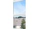 View from window shows houses and blue sky at 174 Piave St, Haines City, FL 33844