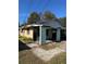Fixer-upper home with a large yard needing landscaping at 1804 Mable Butler Ave, Orlando, FL 32805
