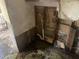 A kitchen needing renovation, showing exposed pipes and water damage at 1804 Mable Butler Ave, Orlando, FL 32805
