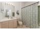 Clean bathroom with shower/tub combo and updated vanity at 2303 Butterfly Palm Way # 201, Kissimmee, FL 34747