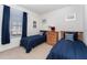 Twin bedroom with two beds and plenty of natural light at 2303 Butterfly Palm Way # 201, Kissimmee, FL 34747