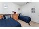 Twin bedroom with two beds and shared dresser at 2303 Butterfly Palm Way # 201, Kissimmee, FL 34747