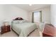 Spacious Primary bedroom with king-size bed and seating area at 2303 Butterfly Palm Way # 201, Kissimmee, FL 34747