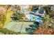 Community pool, tennis courts, playground, and clubhouse at 231 Goldenrain Dr # 4304, Celebration, FL 34747