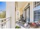Relaxing balcony with seating and views at 231 Goldenrain Dr # 4304, Celebration, FL 34747