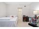 Comfortable bedroom with double bed and home office at 231 Goldenrain Dr # 4304, Celebration, FL 34747