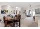 Dining area with table and view into living room at 231 Goldenrain Dr # 4304, Celebration, FL 34747