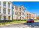 Apartment building with traditional architecture and landscaping at 231 Goldenrain Dr # 4304, Celebration, FL 34747