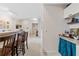 Kitchen with breakfast bar and view to hallway at 231 Goldenrain Dr # 4304, Celebration, FL 34747