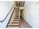 Indoor stairwell with modern railings and lighting at 231 Goldenrain Dr # 4304, Celebration, FL 34747