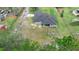 Aerial view of home on acreage with fenced yard at 30810 Nocatee Trl, Sorrento, FL 32776