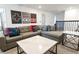 Spacious game room with sectional sofa and game-themed decor at 4209 Paragraph Dr, Kissimmee, FL 34746