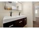 Bathroom with a double vanity and modern fixtures at 5533 Westbury Dr, Orlando, FL 32808