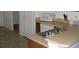 Kitchen with double sink, wood cabinets, and a beige countertop at 603 Keppel Ct, Kissimmee, FL 34746