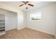 Bedroom with spacious closet and wood-look floors at 6150 Medford Dr, Orlando, FL 32808