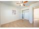 Simple bedroom with light flooring and a built-in closet at 6150 Medford Dr, Orlando, FL 32808