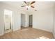 Bedroom with ensuite bathroom and ceiling fan at 6150 Medford Dr, Orlando, FL 32808