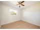 Bright bedroom with ceiling fan and light wood flooring at 6150 Medford Dr, Orlando, FL 32808