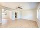 Open living room with wood-look floors and high ceilings at 6150 Medford Dr, Orlando, FL 32808