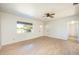 Living room featuring light wood floors and ceiling fan at 6150 Medford Dr, Orlando, FL 32808