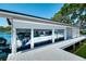 Covered boat slips with a dock in a lakeside boathouse at 6517 Cay Cir, Belle Isle, FL 32809